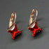 Auskari "Bizantijas Krusts (Light Siam Metallic Light Gold)" ar Swarovski™ kristāliem